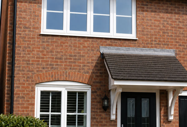 Hard to reach upper windows in Epsom before cleaning